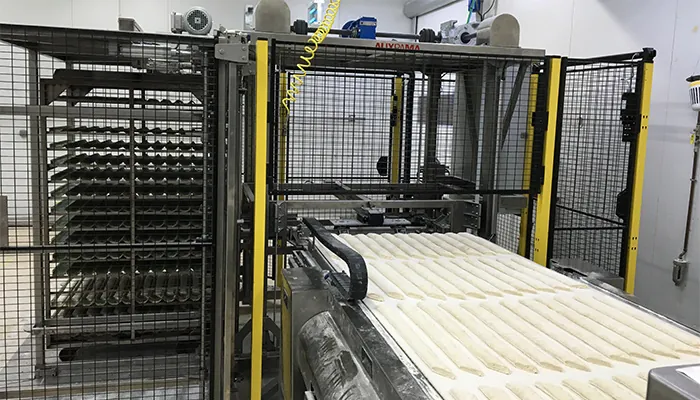 Auxpama AliCAR loading trays from a rack